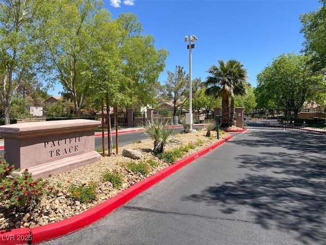 1861 Windward Ct, Henderson, NV 89012 - community sign featuring a gate and fence