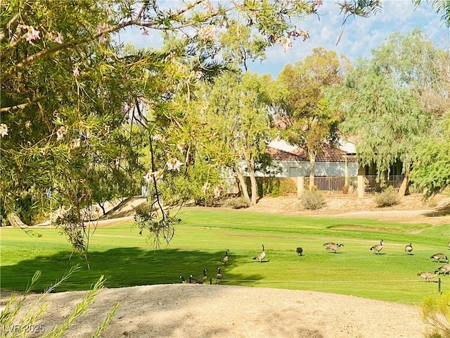 5381 Waving Sage Dr, Las Vegas, NV 89149 - view of property's community featuring a lawn and view of golf course