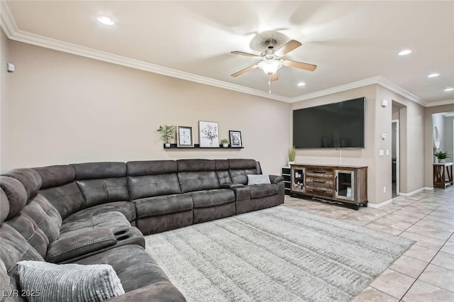 living area featuring ceiling fan, light tile patterned floors, recessed lighting, ornamental molding, and baseboards