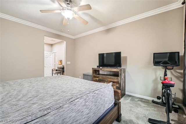 carpeted bedroom featuring ornamental molding, baseboards, and a ceiling fan