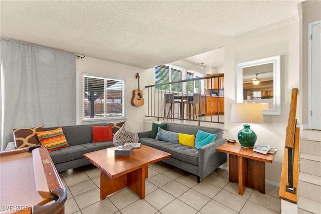 5361 Cabrito Dr, Las Vegas, NV 89103 - living room with a textured ceiling and light tile patterned floors