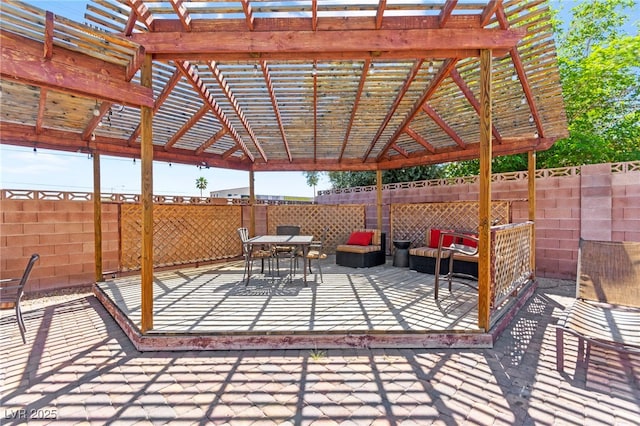 5361 Cabrito Dr, Las Vegas, NV 89103 - view of patio / terrace featuring fence, a pergola, and outdoor dining area
