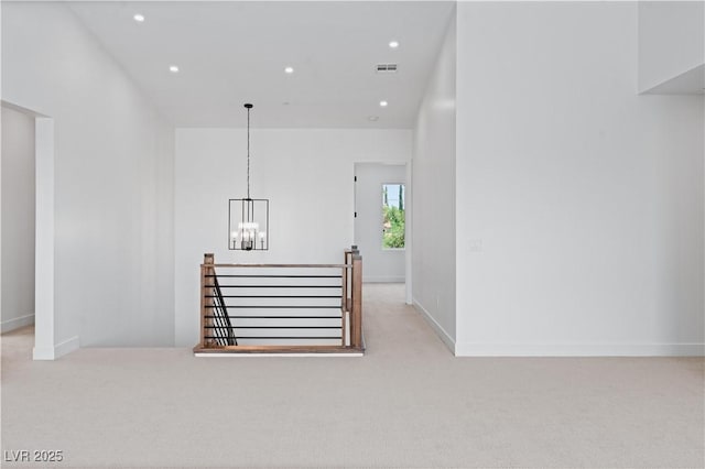 8721 Robinson Ridge Dr, Las Vegas, NV 89117 - spare room with a chandelier, carpet flooring, and recessed lighting
