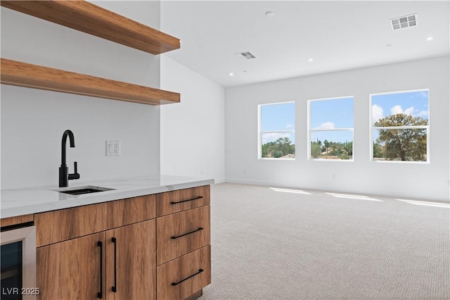 8721 Robinson Ridge Dr, Las Vegas, NV 89117 - bar area with light colored carpet, plenty of natural light, recessed lighting, and wine cooler