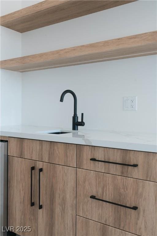 8721 Robinson Ridge Dr, Las Vegas, NV 89117 - detailed view of light countertops, open shelves, and modern cabinets