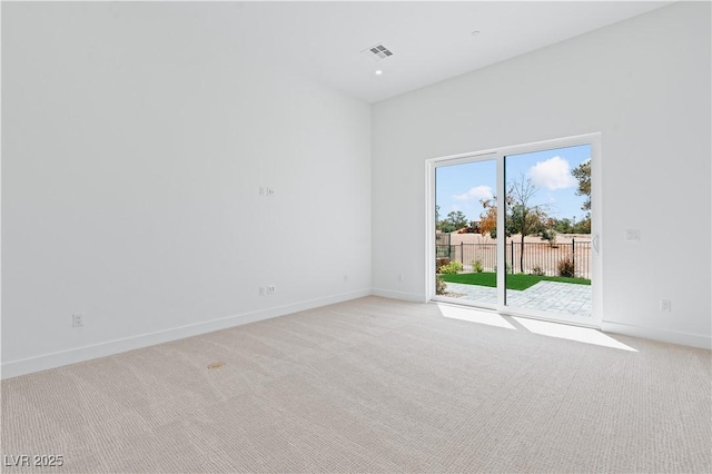 8721 Robinson Ridge Dr, Las Vegas, NV 89117 - spare room featuring light colored carpet and baseboards
