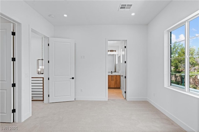 8721 Robinson Ridge Dr, Las Vegas, NV 89117 - unfurnished bedroom featuring multiple windows, light colored carpet, and recessed lighting