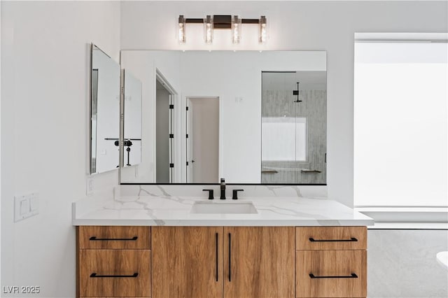 8721 Robinson Ridge Dr, Las Vegas, NV 89117 - bathroom featuring vanity and a walk in shower