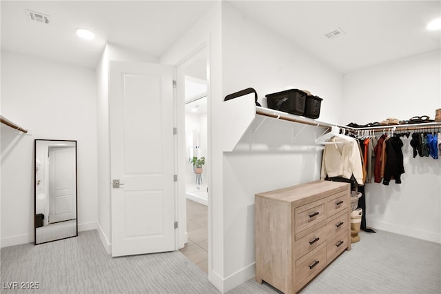 9815 Evergreen Pine St, Las Vegas, NV 89166 - walk in closet featuring light colored carpet and visible vents
