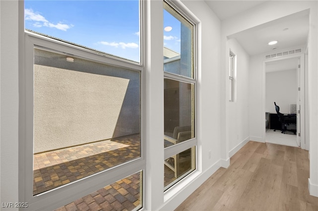 9815 Evergreen Pine St, Las Vegas, NV 89166 - hallway with visible vents, recessed lighting, and wood finished floors