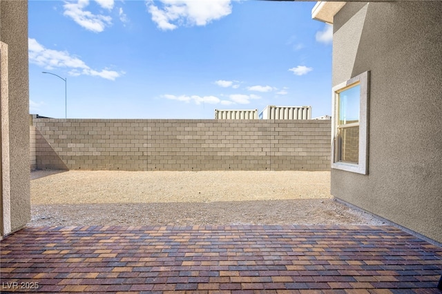 9815 Evergreen Pine St, Las Vegas, NV 89166 - view of patio with a fenced backyard