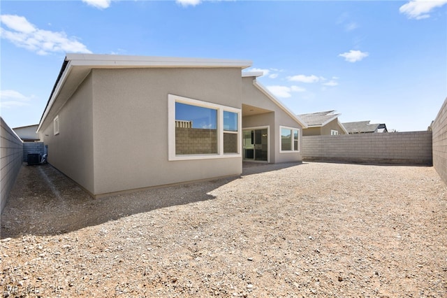 9815 Evergreen Pine St, Las Vegas, NV 89166 - rear view of house featuring a fenced backyard and stucco siding