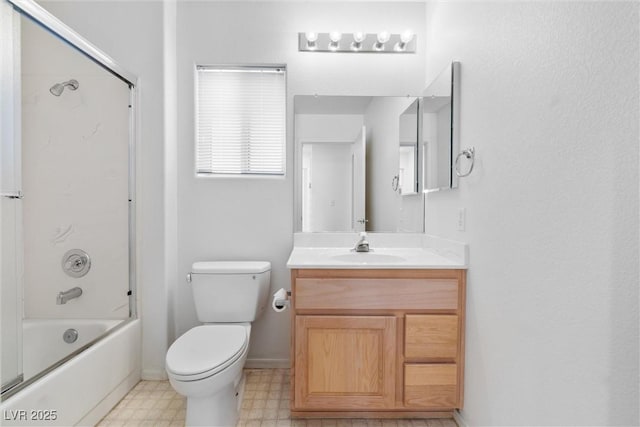bathroom featuring toilet, tile patterned floors, shower / bath combination, and vanity