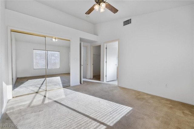 unfurnished bedroom with carpet flooring and visible vents