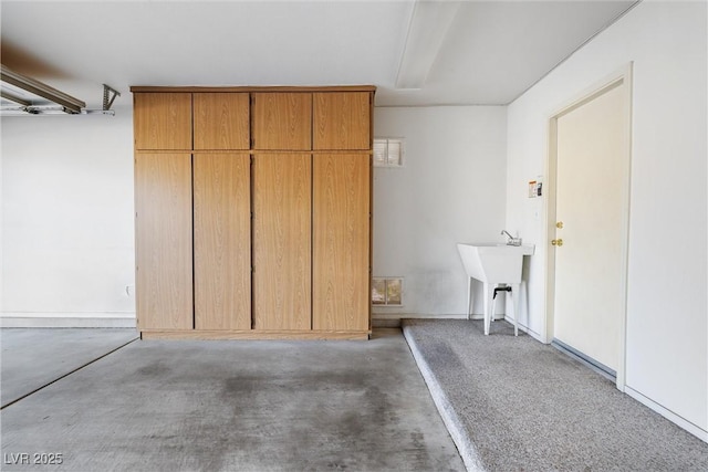 garage featuring a sink