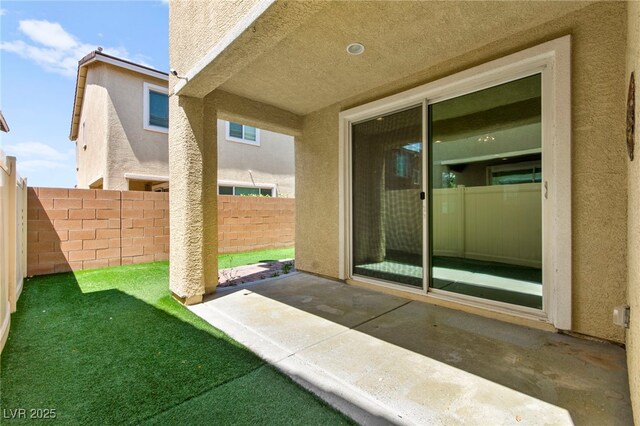 view of patio with a fenced backyard