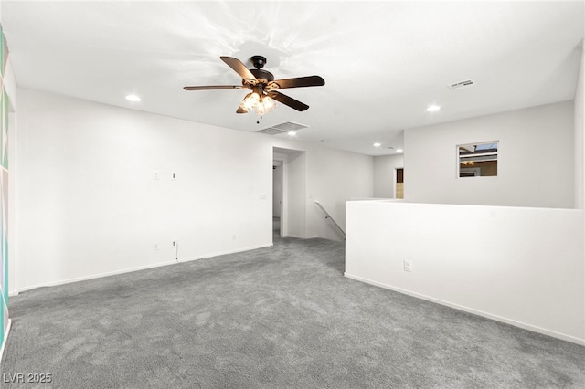 spare room featuring visible vents, baseboards, ceiling fan, recessed lighting, and carpet flooring