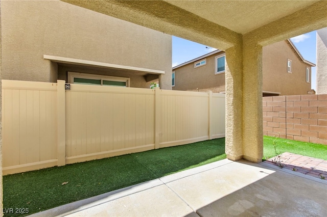 view of yard featuring a fenced backyard and a patio
