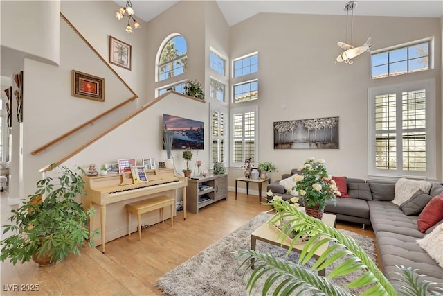 2909 Sterling Cove Dr, Las Vegas, NV 89128 - living area featuring high vaulted ceiling and wood finished floors