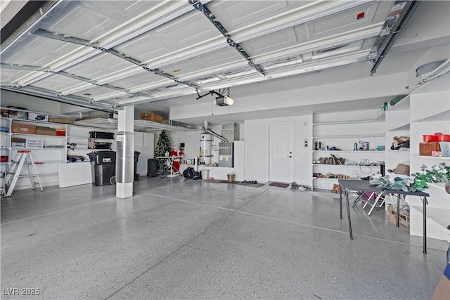 2909 Sterling Cove Dr, Las Vegas, NV 89128 - garage with a garage door opener and secured water heater