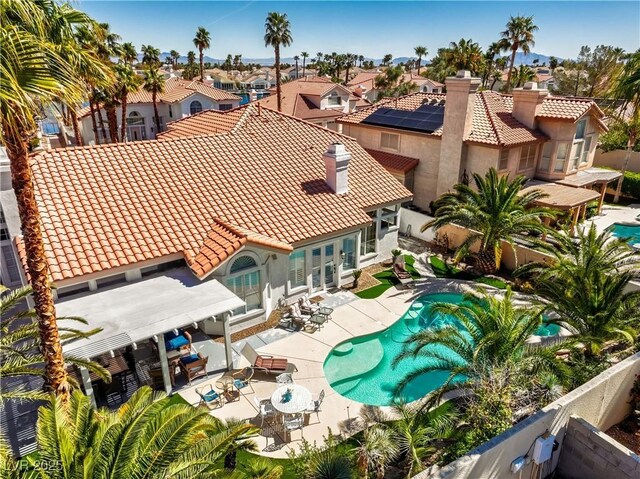 2909 Sterling Cove Dr, Las Vegas, NV 89128 - exterior space with outdoor dining area, a fenced backyard, a patio area, and a residential view
