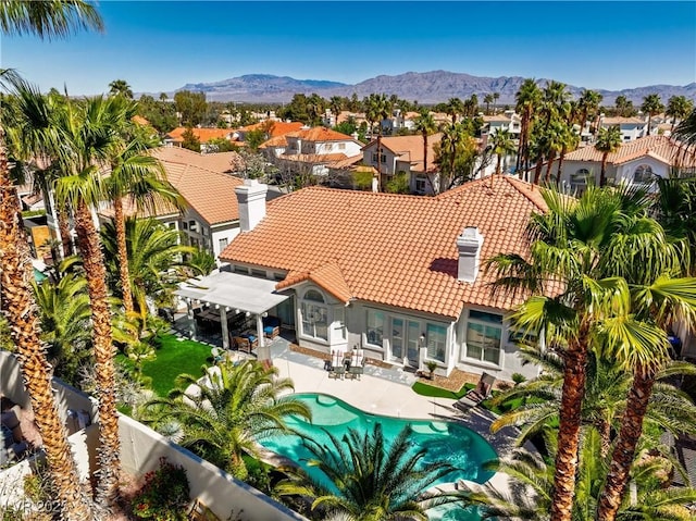 2909 Sterling Cove Dr, Las Vegas, NV 89128 - exterior space with a tiled roof, a residential view, a patio area, a fenced backyard, and a pergola
