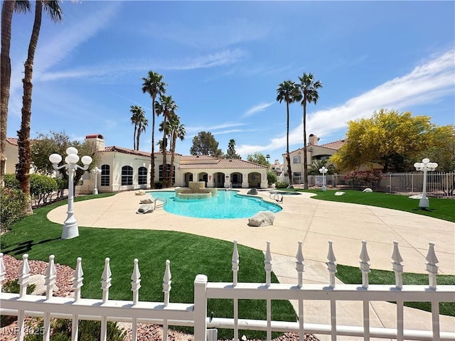 698 S Racetrack Rd Unit 322, Henderson, NV 89015 - pool featuring fence, a patio, and a lawn