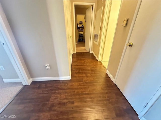 698 S Racetrack Rd Unit 322, Henderson, NV 89015 - hall with baseboards and dark wood finished floors