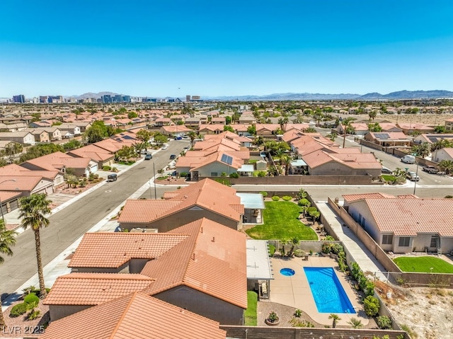 drone / aerial view with a mountain view and a residential view