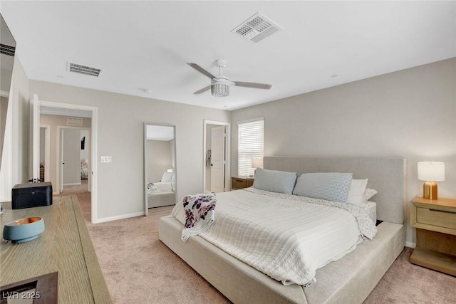 bedroom with baseboards, visible vents, light carpet, and ceiling fan