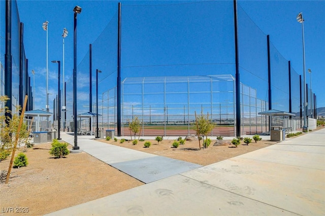 view of property's community featuring fence