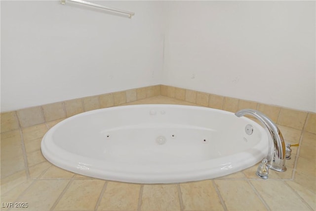 full bathroom with a jetted tub and tile patterned floors