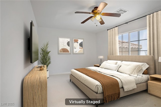 bedroom featuring visible vents, baseboards, ceiling fan, and carpet floors