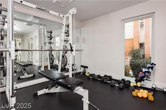 workout area with baseboards