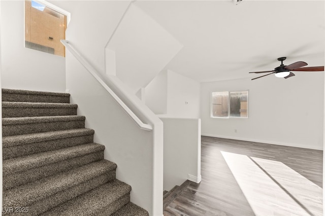 10525 Shiny Skies Dr, Las Vegas, NV 89129 - staircase with baseboards, ceiling fan, and wood finished floors