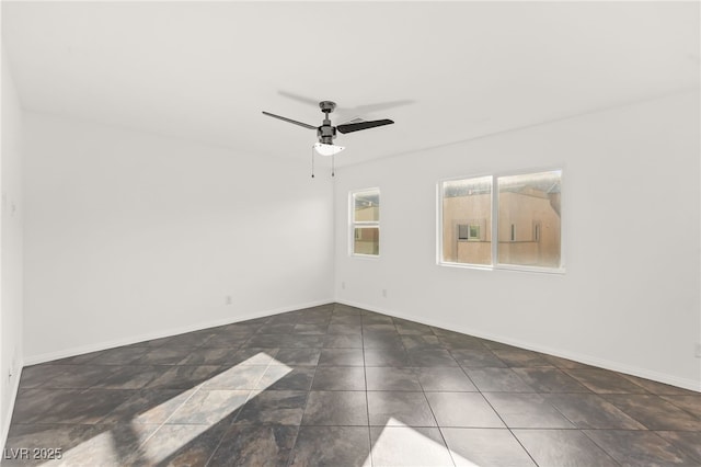 10525 Shiny Skies Dr, Las Vegas, NV 89129 - empty room featuring baseboards and ceiling fan