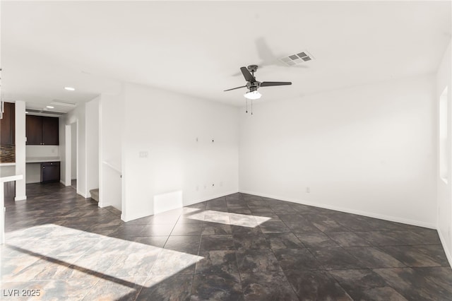 10525 Shiny Skies Dr, Las Vegas, NV 89129 - unfurnished room featuring visible vents, a ceiling fan, and baseboards