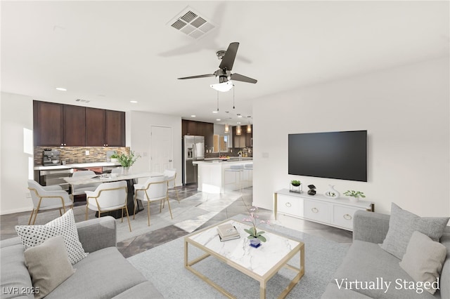 10525 Shiny Skies Dr, Las Vegas, NV 89129 - living area with ceiling fan, recessed lighting, and visible vents