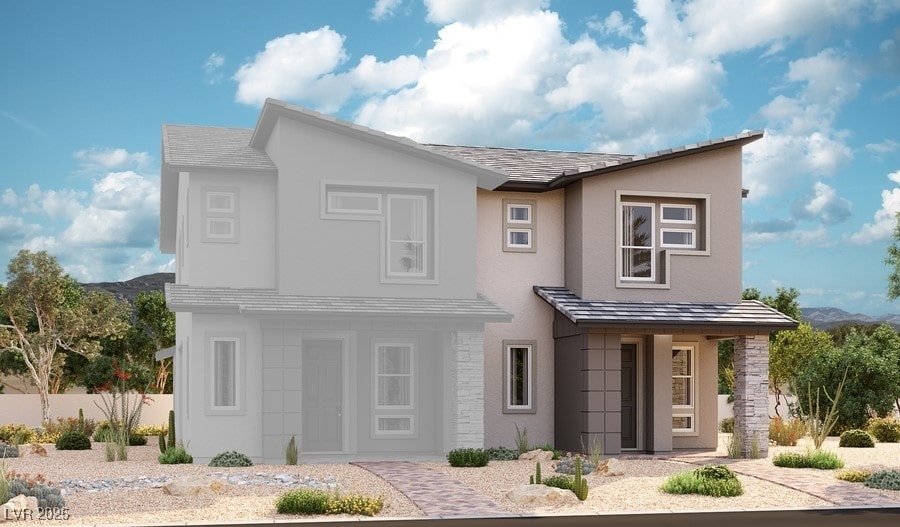 exterior space featuring a mountain view and stucco siding