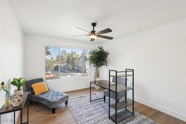 3425 E Russell Rd Unit 202, Las Vegas, NV 89120 - home office with ceiling fan, baseboards, and wood finished floors