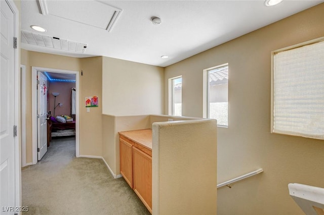 1007 Shades End Ave, North Las Vegas, NV 89081 - hall with light colored carpet, baseboards, and recessed lighting