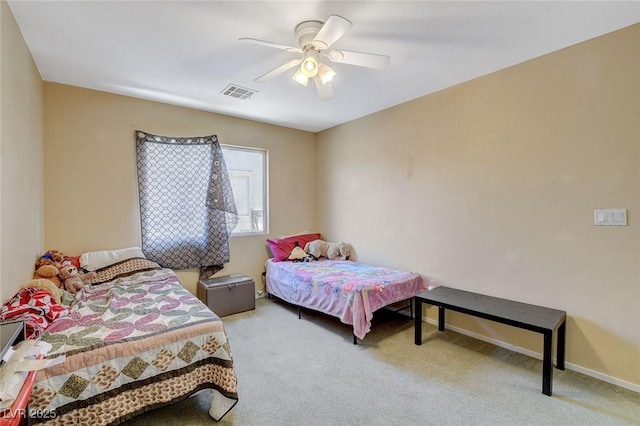 1007 Shades End Ave, North Las Vegas, NV 89081 - bedroom featuring carpet flooring, a ceiling fan, and baseboards