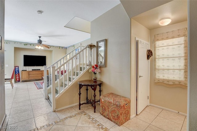 1007 Shades End Ave, North Las Vegas, NV 89081 - stairs with tile patterned floors, ceiling fan, and baseboards