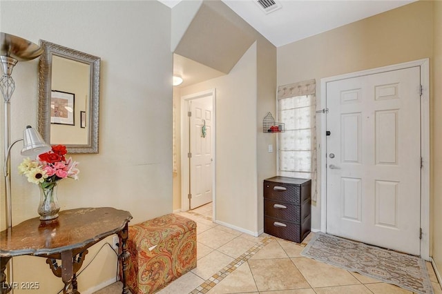 1007 Shades End Ave, North Las Vegas, NV 89081 - entryway featuring light tile patterned flooring and baseboards
