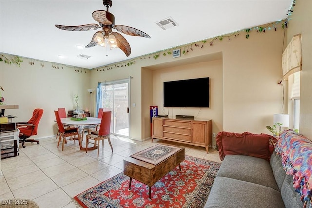 1007 Shades End Ave, North Las Vegas, NV 89081 - living area featuring light tile patterned floors, a ceiling fan, and baseboards