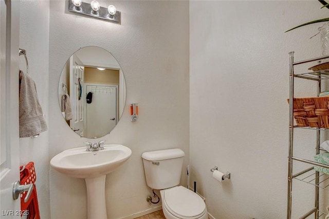 1007 Shades End Ave, North Las Vegas, NV 89081 - half bathroom with toilet and a sink