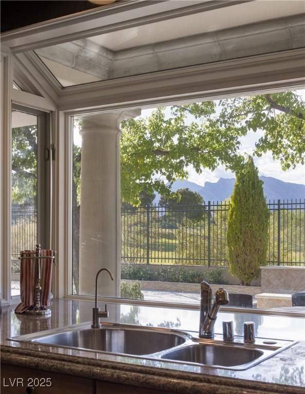 kitchen with a sink and a mountain view