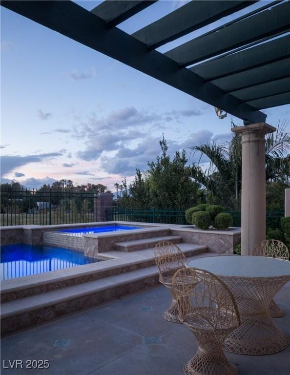 view of pool with a fenced in pool, a fenced backyard, and an in ground hot tub