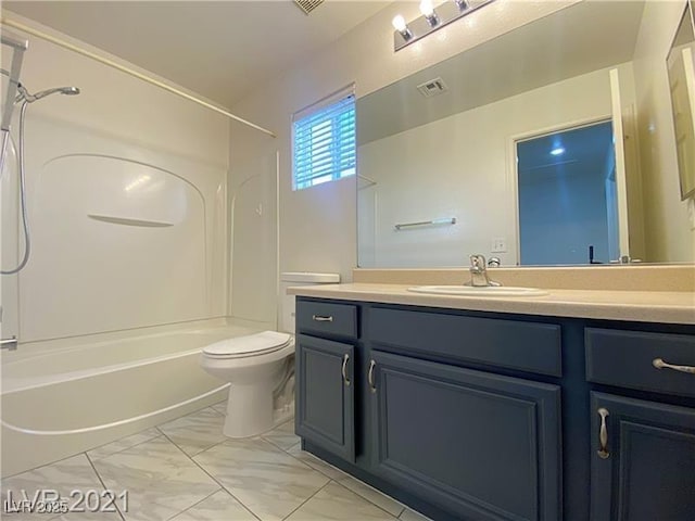 bathroom with vanity, toilet, marble finish floor, tub / shower combination, and visible vents