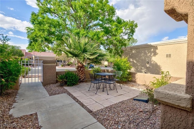 8901 Litchfield Ave, Las Vegas, NV 89134 - view of patio with fence and a gate